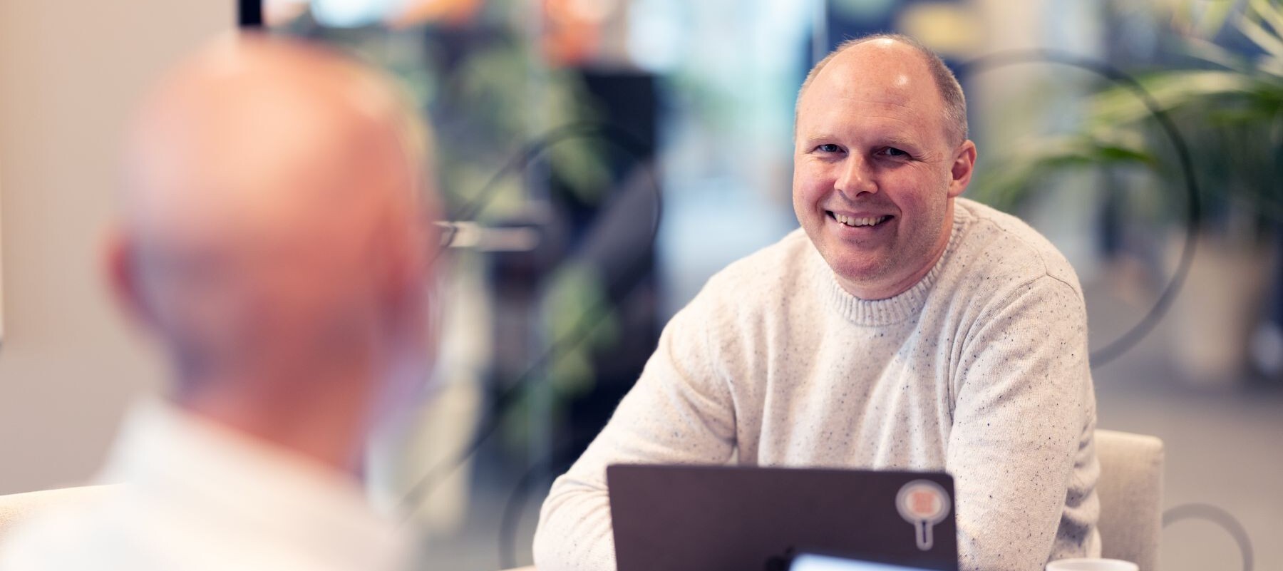 Haakon in a meeting