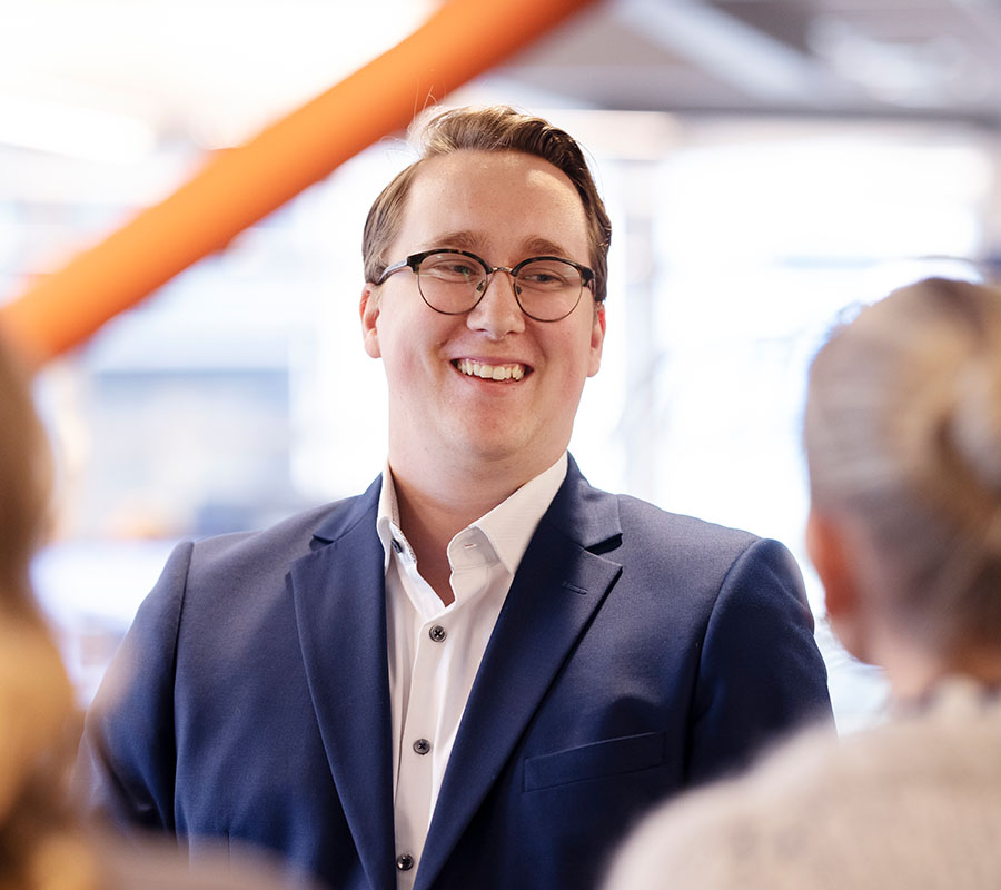 Cloudworks employee laughs in Cloudworks' office